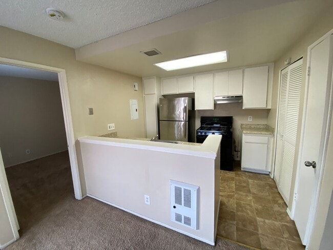 Photo - 2 BR 2 BA Corner Condo w/Balcony W/D Gated Entry Carport + Space Unit 6