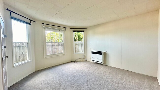 Photo - Sweet ground floor 1 Bedroom with a Sunny Wrap Around Deck and In-Unit Washer & Dryer Unit B