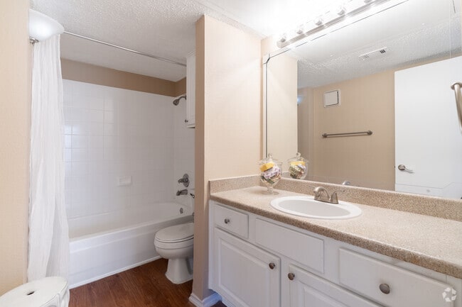 1BR, 1BA – 742SF Bathroom – Bathroom with vanity and bright lighting near Arlington TX - Three60 North Apartments