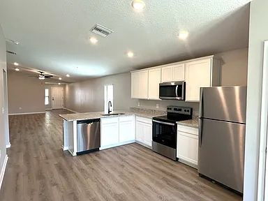 Building Photo - This almost new home is in the beautiful Crossings at Palm River Neighborhood, 5 minutes from 618...