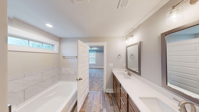 Photo - Beautifully Upgraded Home | Stone Fireplace, Open Kitchen and Two-Car Garage
