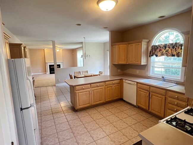 Photo - Spacious 4 Bedroom home with 3 Car Garage - Available June 2026