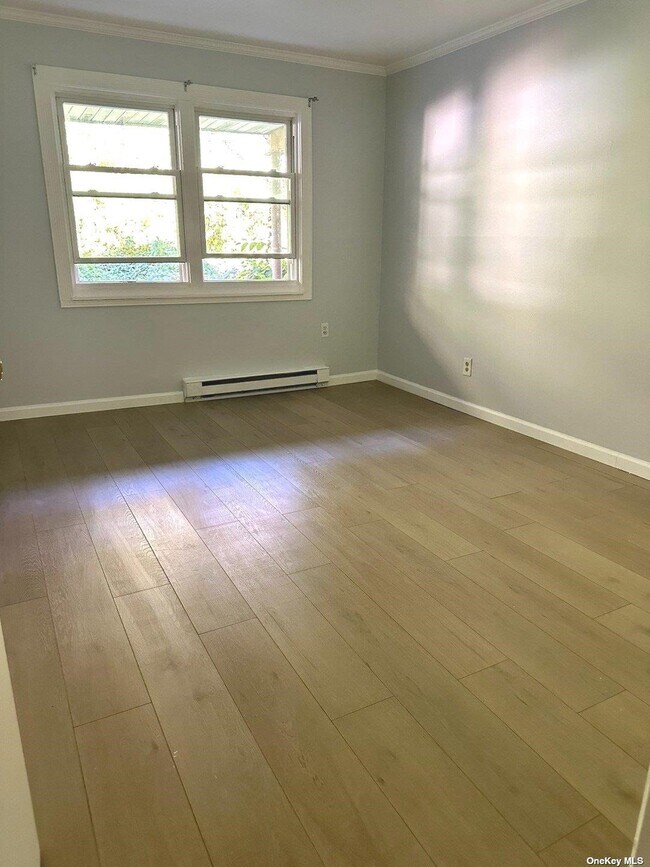 Photo - 13-35-35 Bell Blvd Unit 1 FL