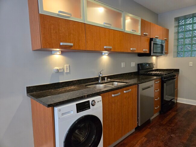 Photo - 1360 W Estes Ave Unit Sun-Drenched 1BR Condo wi