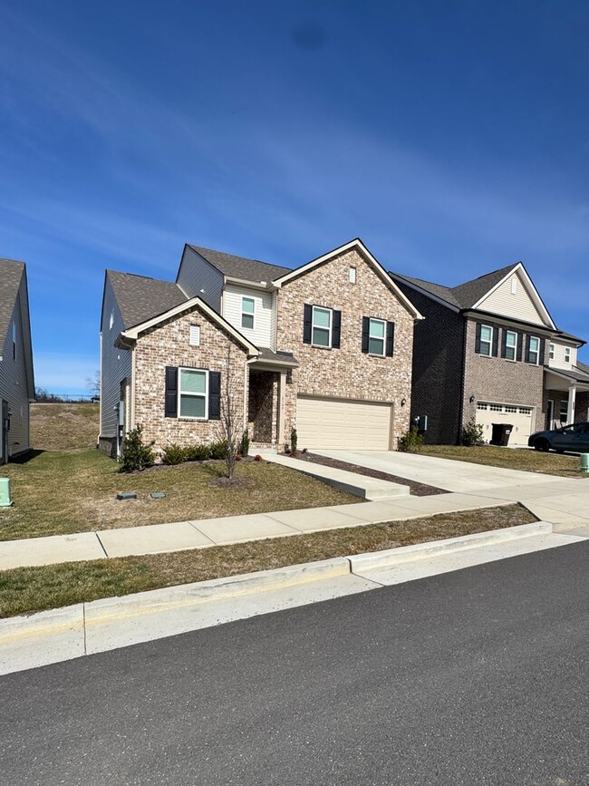 Photo - Fully Furnished 4BR Home with Loft, Patio & 2-Car Garage – Lawn Care Included