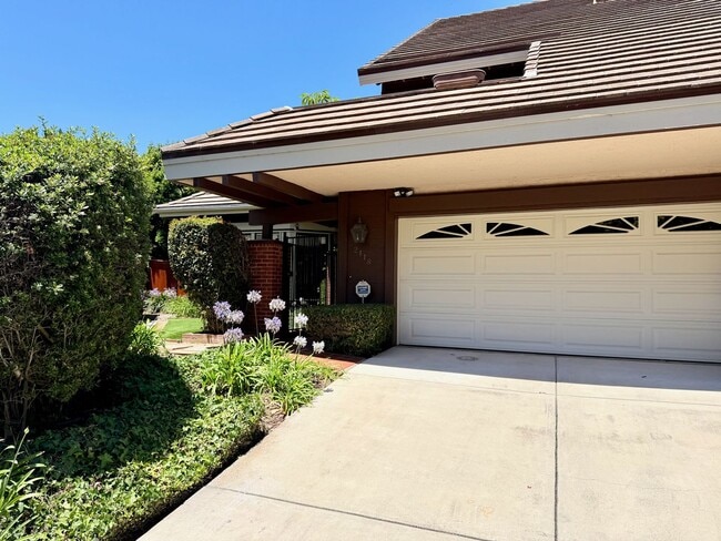 Building Photo - Private Oasis with Sunroom, Balcony & Lush Landscaping | 4BR Home Near Community Pool & Spa