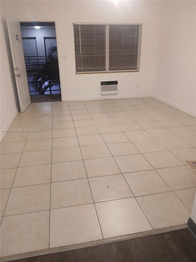 Building Photo - 8220 Byron Ave Unit 12