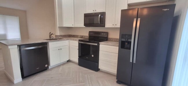 Photo - Exceptional Fully Remodeled 2-Bedroom, 2-Bath Duplex in University PlaceFenced Yard