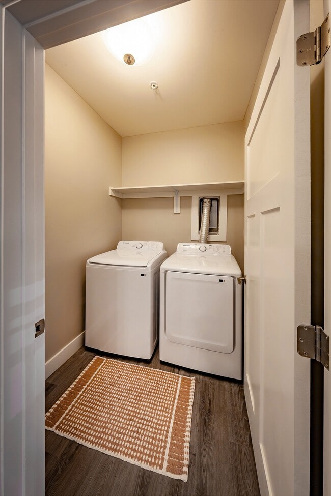 Laundry day just got easier with an energy-efficient washer and dryer, extra storage shelving, and stylish modern finishes.
