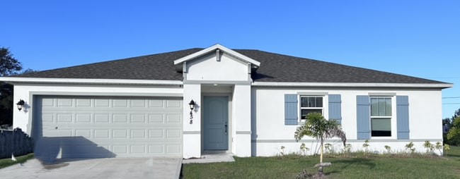 Building Photo - **SPACIOUS 4/2 HOME IN PALM BAY