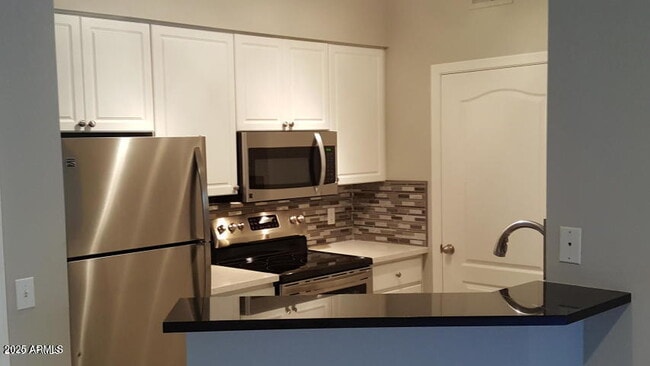 Building Photo - 1701 E Colter St Unit 153