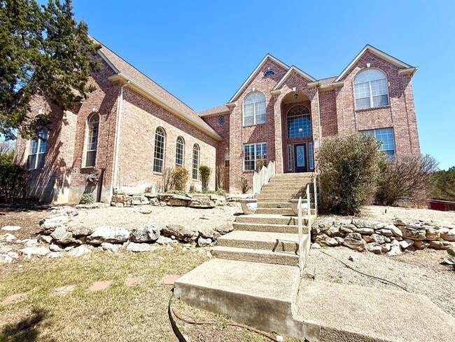 Building Photo - *COMING SOON* Luxurious 2-Story Home in Gated Stone Oak Community – Pool & Lawn Care Included