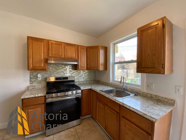 Photo - 2 Bed with Finished Basement, Deck off Bedroom, and Backyard