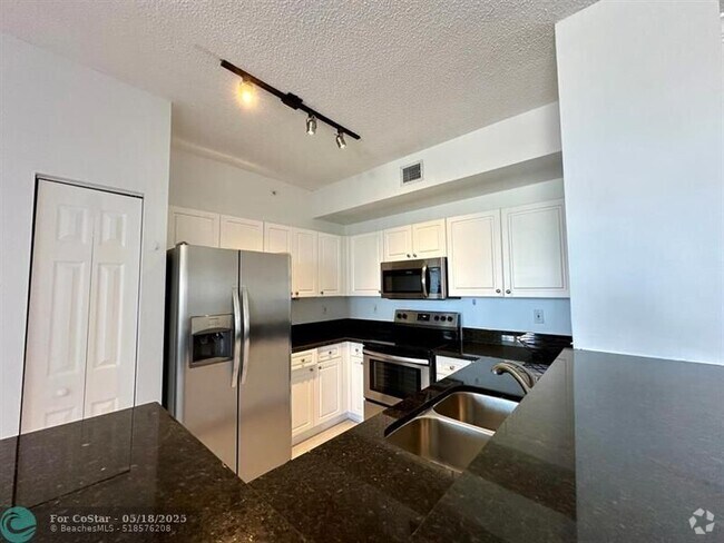 Building Photo - 651 Okeechobee Blvd Unit PH 1204 Rental