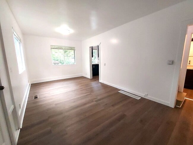 Photo - Spacious 4BD/3BA with Fenced Yard & Front Porch in North Seattle!