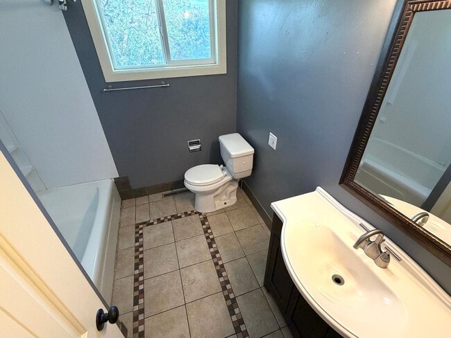 Photo - Pet Friendly 2 bed 1/5 bath Single Family Home With Fully Fenced Yard and Garage in great neighbo...