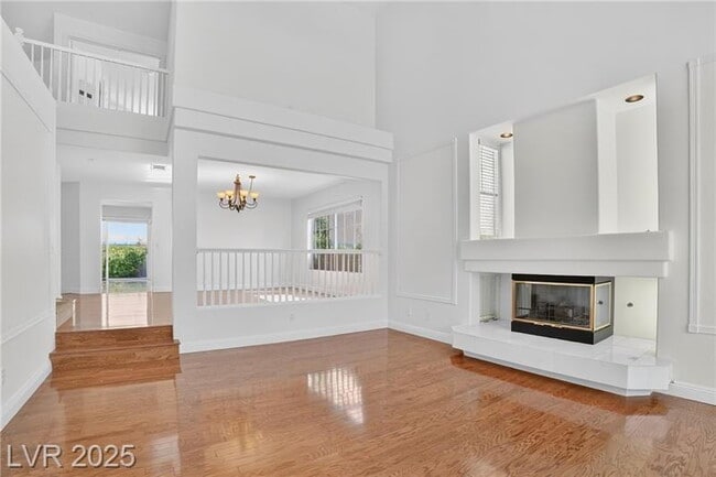 Photo - Exquisite 5-bed, 3-bath home w/ spacious 3-car garage offers luxurious living & effortless entert...