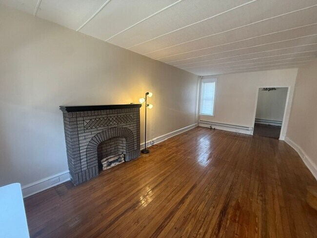 Photo - Inviting 3-Bedroom Rowhome with Semi-Finished Basement & Basement Laundry