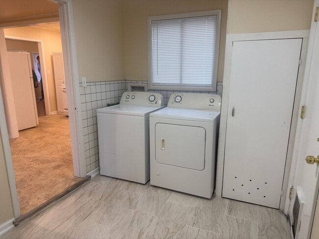 Photo - Step into this beautifully updated 1950's gem, where charm meets modern convenience