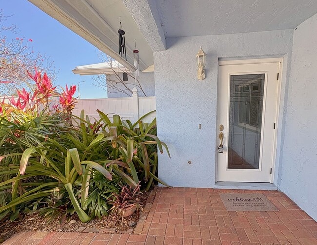 Photo - 3 Bed 2 Bath Home with Large Fenced Backyard & Screened Lanai — Available Now