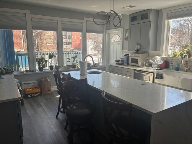 Photo - 4 BED 3.5 BATH RENOVATED HOUSE WITH AC LAUNDRY OUTDOOR SPACE!