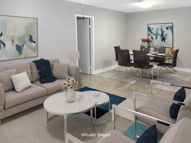 Building Photo - 11277 W Atlantic Blvd Unit 205