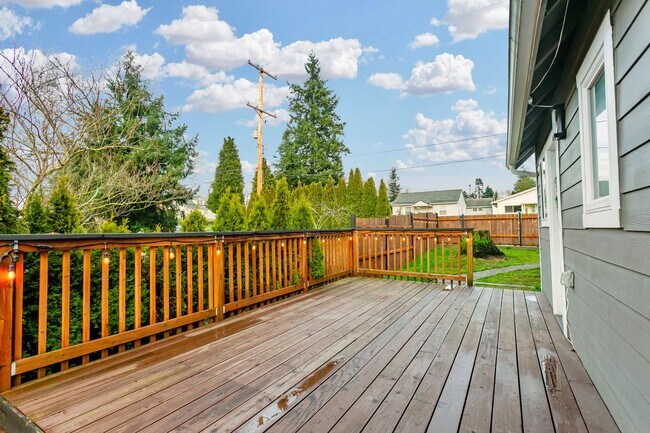 Photo - Spacious 4-Bedroom Tacoma Home with Fireplace & Deck **$500 OFF FIRST MONTHS RENT**