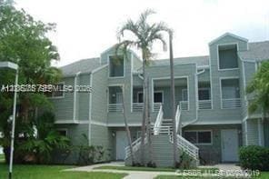 Building Photo - 3429 NW 44th St Unit 205