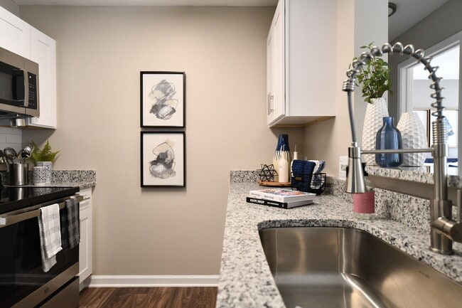 Galley Style Kitchen with upgrades Cabinets, Counters and Appliances
