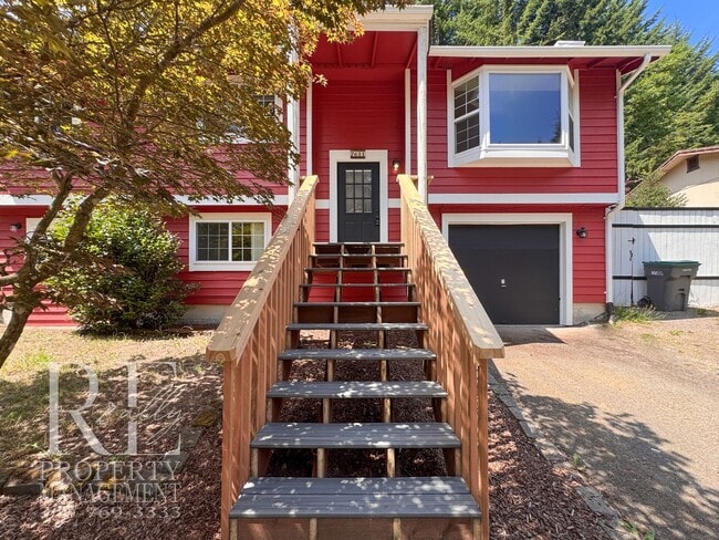 Building Photo - Freshly Painted East Bremerton Home with Expansive Decks & Flexible Living Space