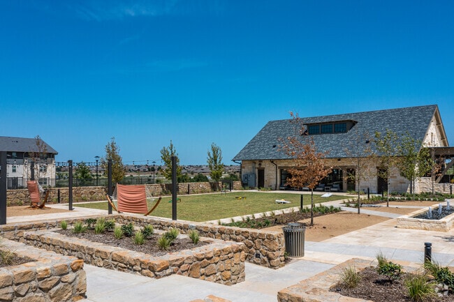Expansive Greens with Walking Paths, Hammocks, and Room to Play - Cortland Chisholm Trail
