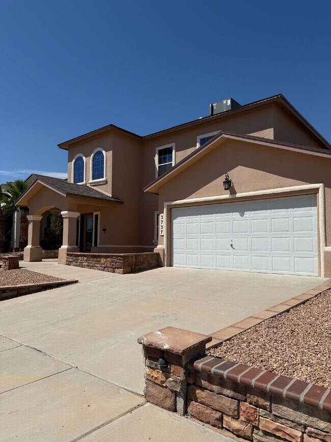Photo - "Spacious 4-Bedroom Oasis with Granite Kit...