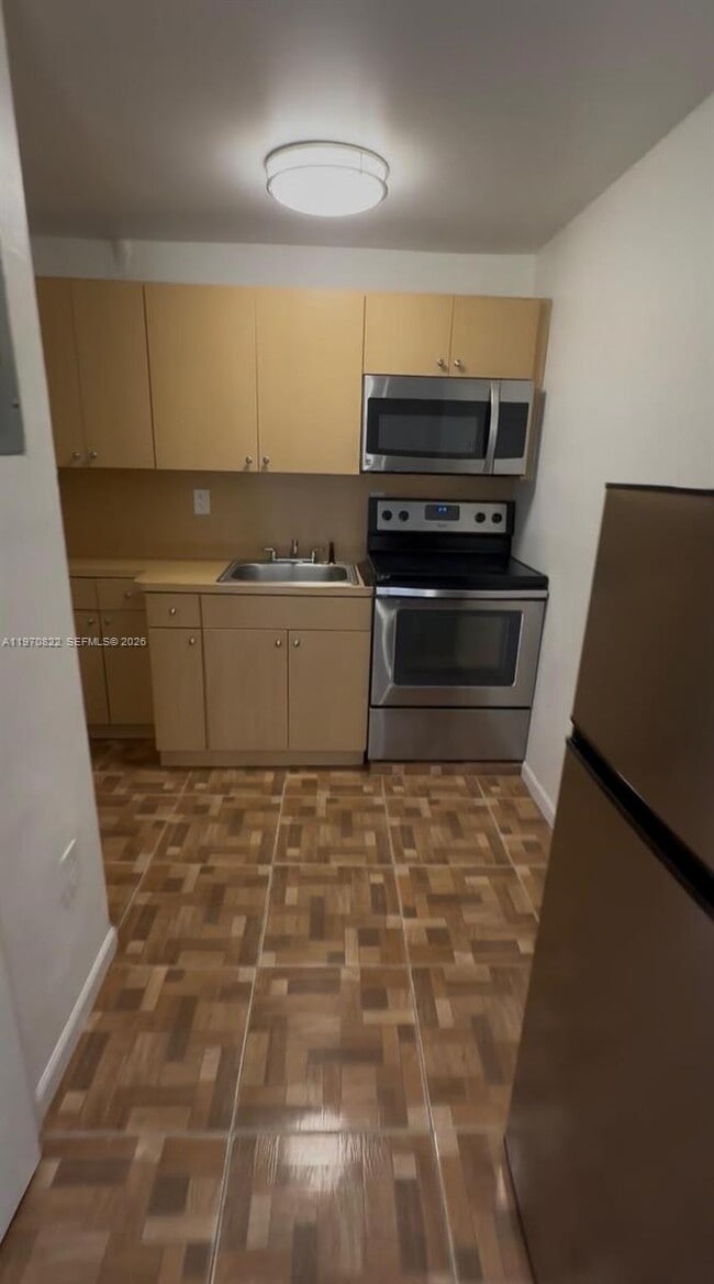 Building Photo - 9828 NW 26th Ave Unit 2