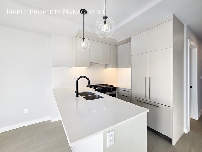 Photo - AMAZING BRAND NEW NEVER LIVED IN 2 BEDS, 2 BATHS CONDO Unité 203