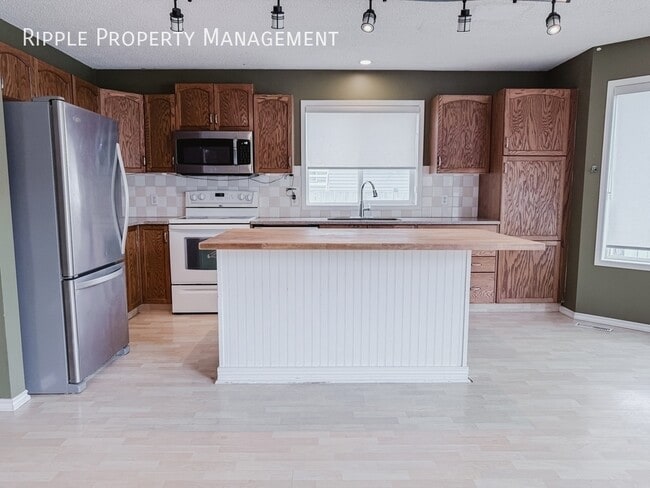 Photo - AMAZING 3 BEDS, 2.5 BATHS UPPER UNIT | Double Detached Garage & Private Backyard