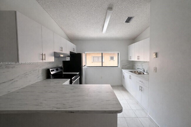 7891 W 29th Way Unit 202