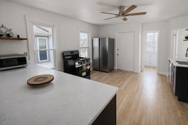 Building Photo - 439-441 E Dover St Unit 439 upper