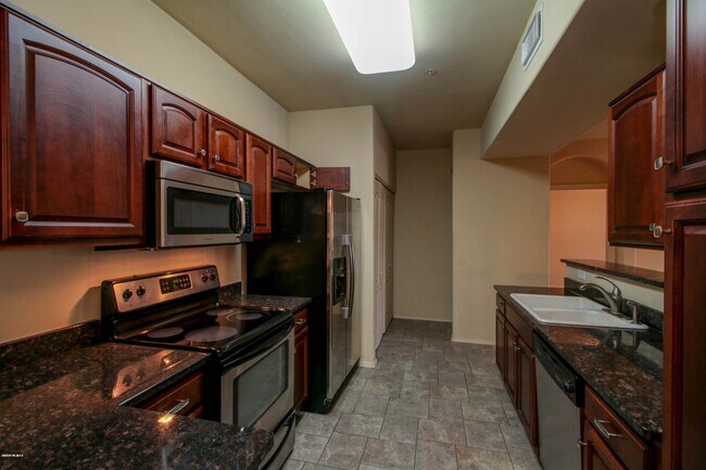 Photo - 2550 E River Rd Unidad 12202