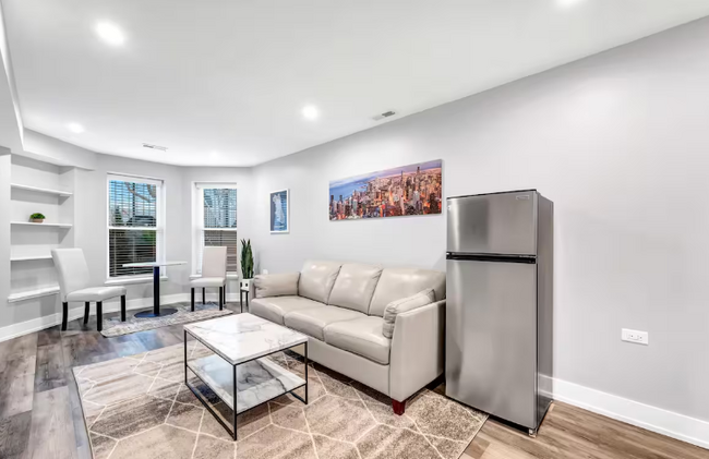 Living room - 2950 S Poplar Ave Apartments Unit B