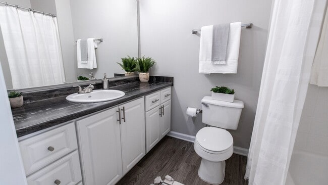 Pamper yourself with the master bathroom's oversized vanity and mirror.