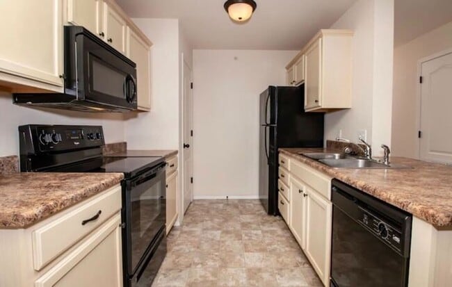 Photo - Town & Country Apartments