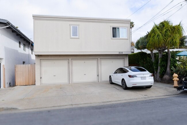 Building Photo - Sunny 2BR/2BA Coastal Retreat — Steps from the Sand with Ocean Breezes Unit #B