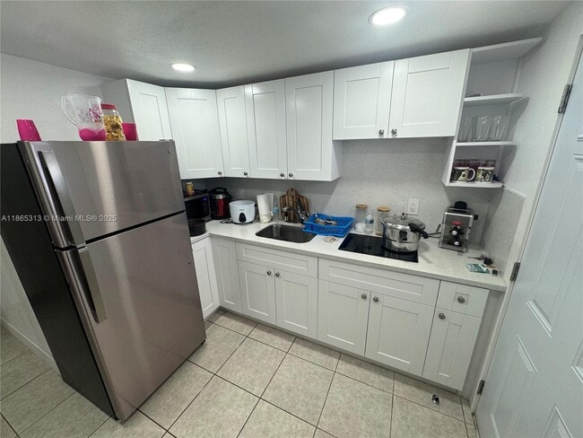 Building Photo - 5832 SW 2nd St Unit 2 Rental