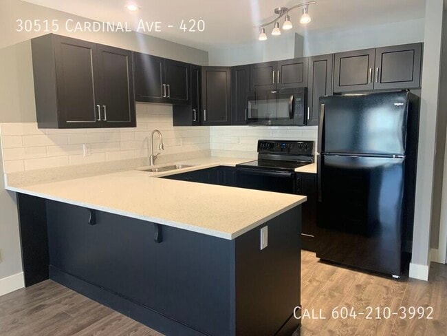 Building Photo - Top Floor At Tamarind Unit 420