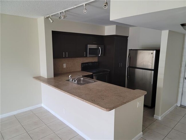 Photo - 3730 N Pine Island Rd Condominio Unidad 249