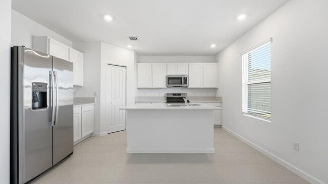 Photo - 10761 NW Everbreeze Dr