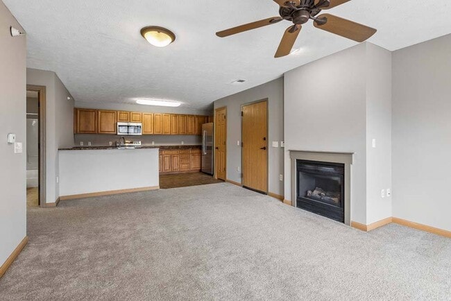 Enjoy the comfort of open-concept living in this inviting space, where cozy details and seamless flow make entertaining effortless.