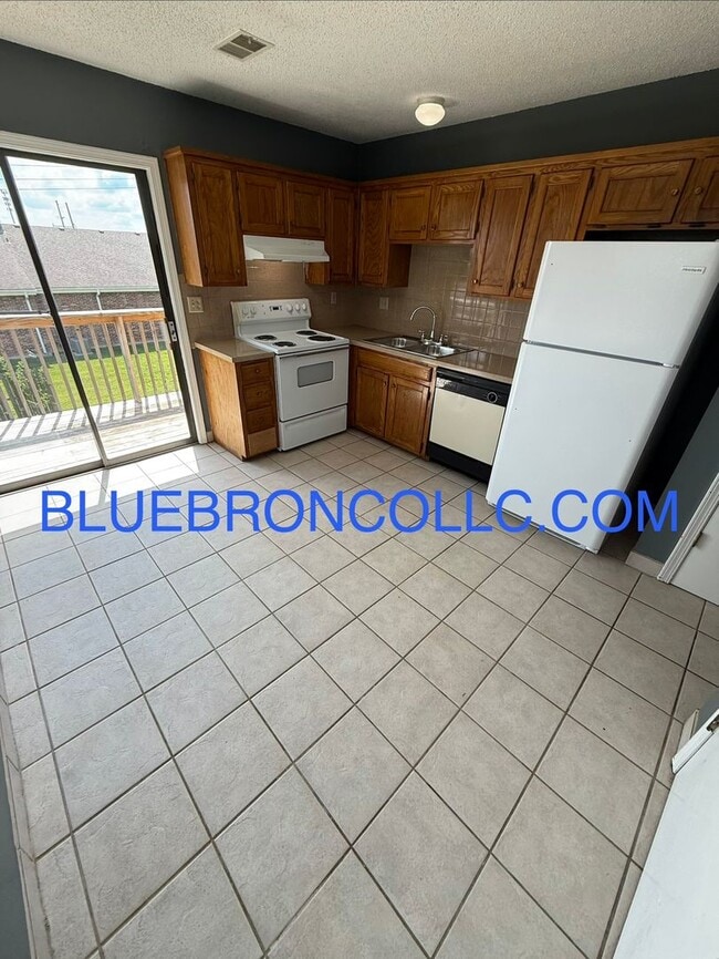 Photo - Cute 2 bedroom 1 bathroom home with a 1 car garage Unit C