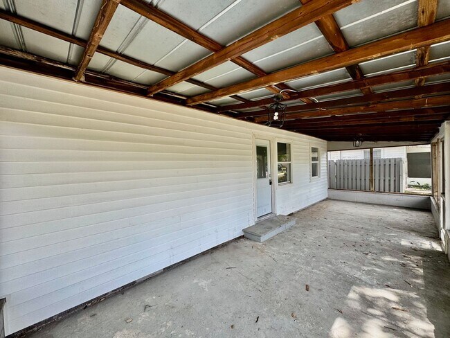Photo - GORGEOUS REMODELED 3BR/2BA Zephyrhills Home with HUGE SCREENED IN PORCH and Shed