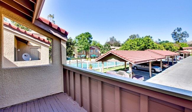 Some private patios offer a view of the swimming pool